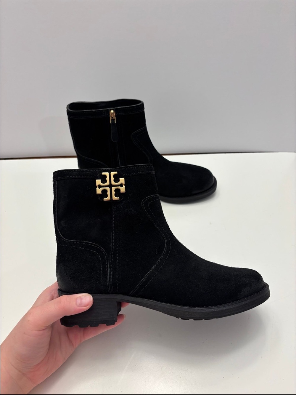 Tory Burch black suede Eloise flat booties with a prominent gold-tone metal logo - Picture 2 of 12